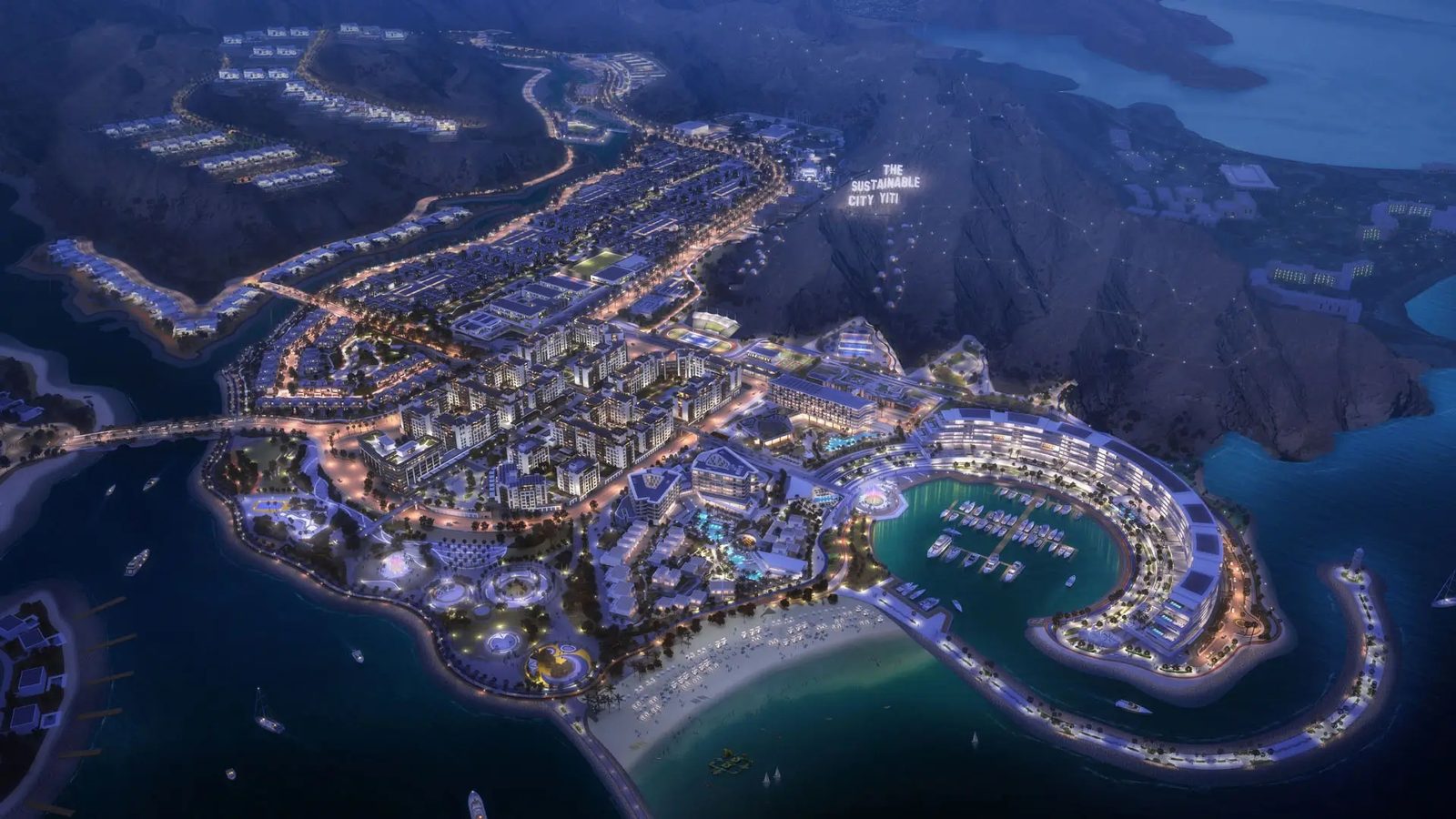 The Sustainable City Yiti at night, aerial view of the marina and neighbourhoods