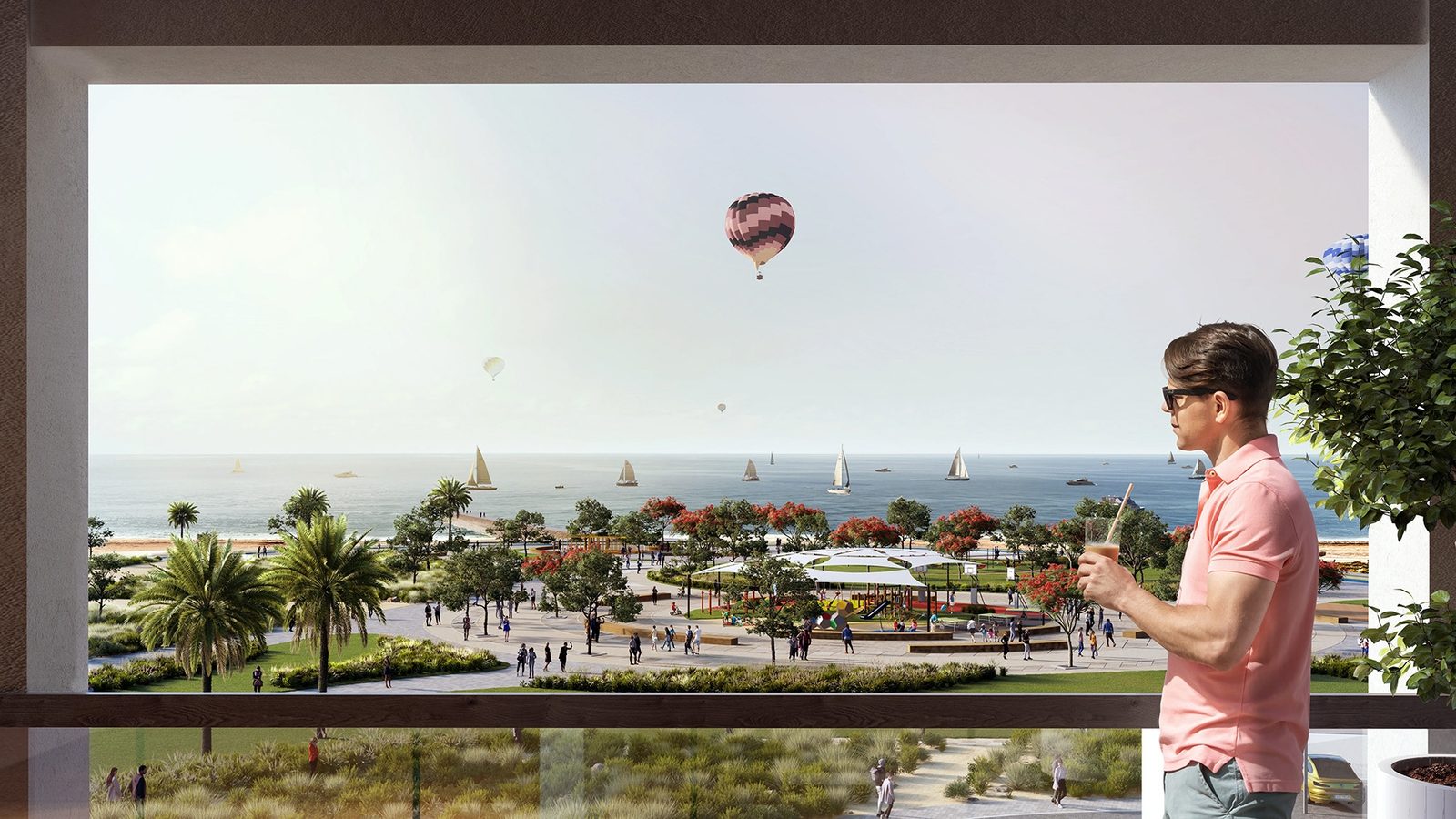 View of the beach park and sea from a residence balcony